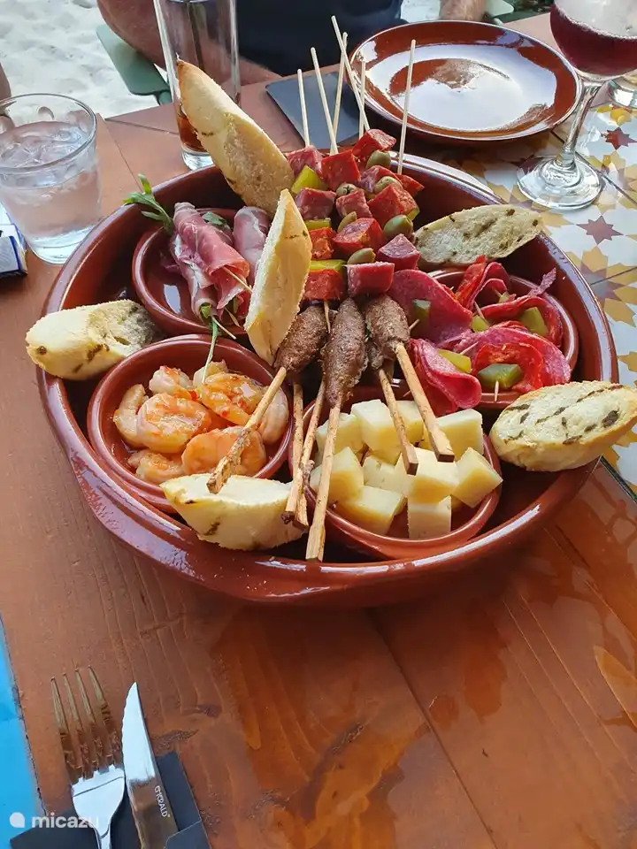 Snacking on the beach within walking distance of the house is Piraten Bay Tapas Bar