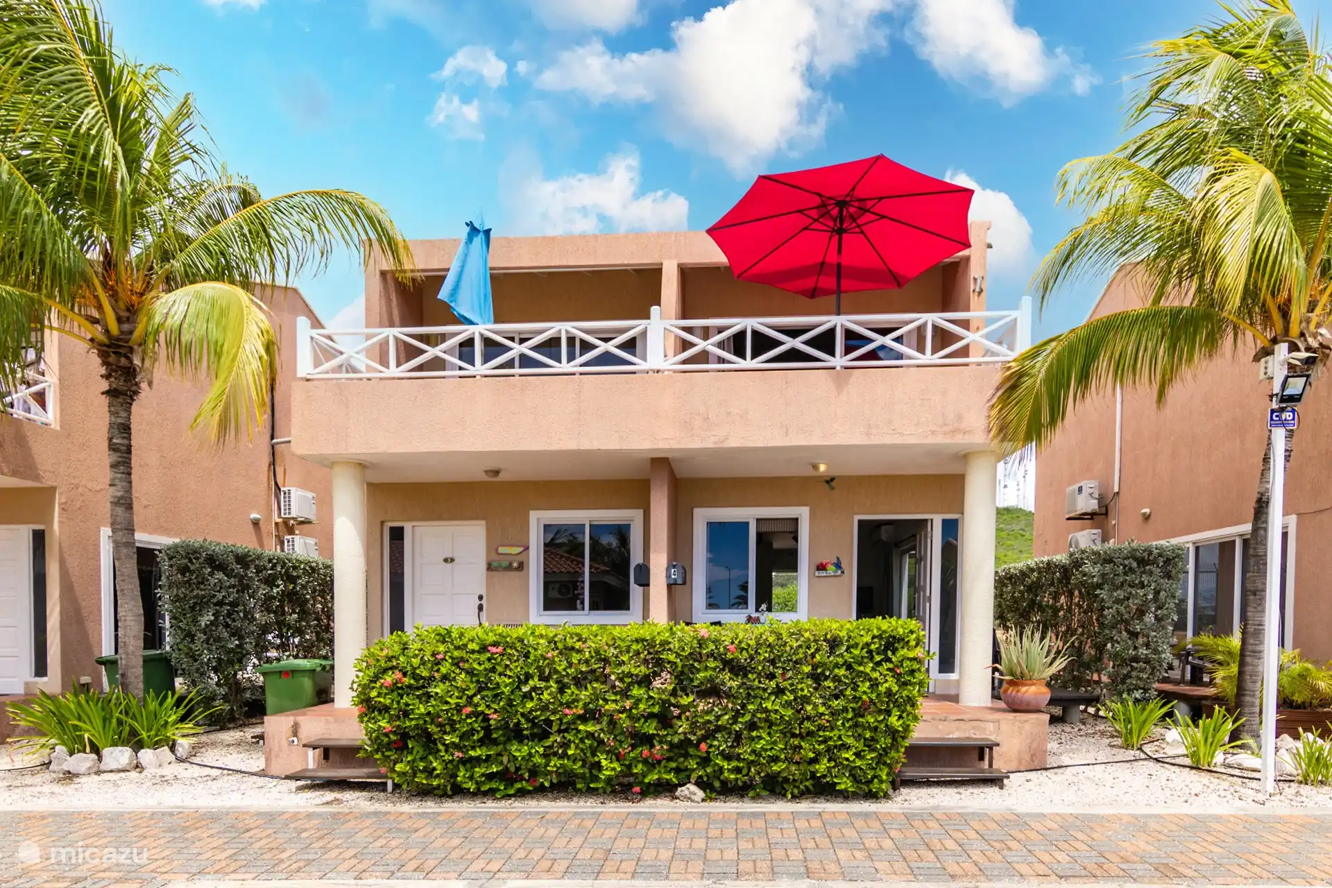 Front of the house with private parking space