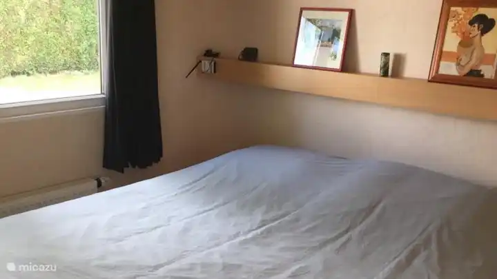 Slaapkamer met 2-persoonsbed