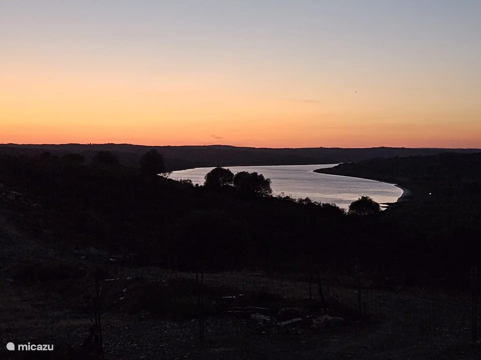 Abendfoto des Guadiana Flusses vom Balkon aus