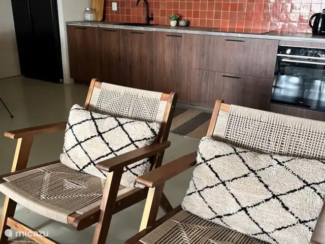 vakantiehuis huren in Curaçao, Banda Ariba (oost), Cas Grandi – Resortje met zwembad nabij strand A1 Woonkamer