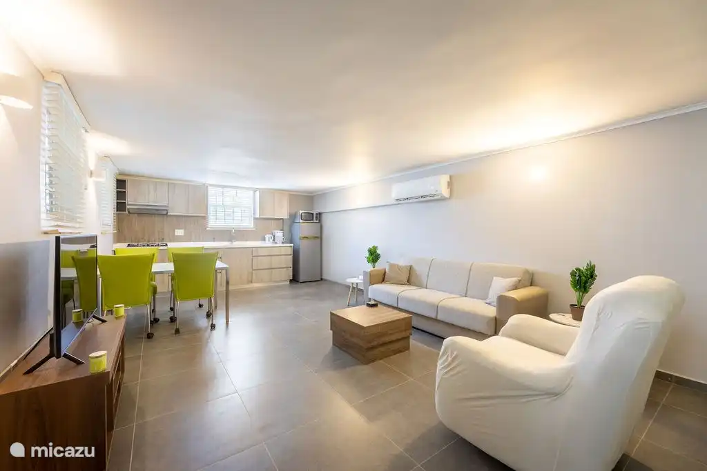 Living room with open kitchen