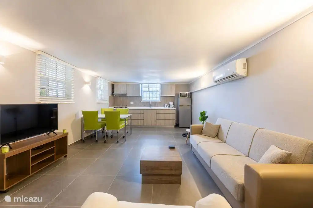 Living room with open kitchen