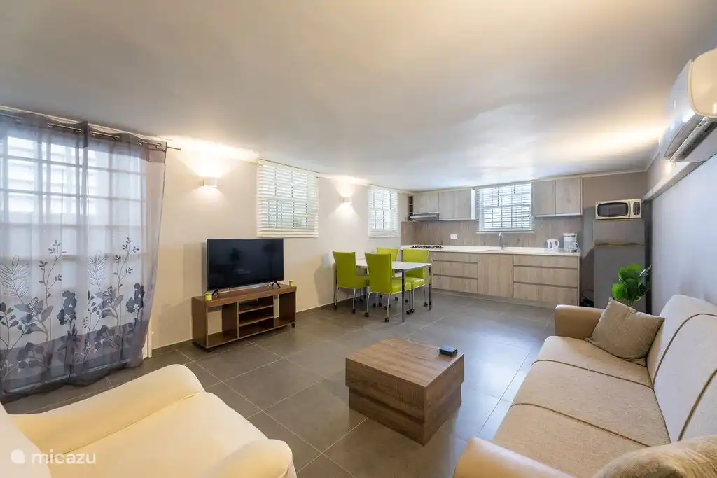 Living room with open kitchen