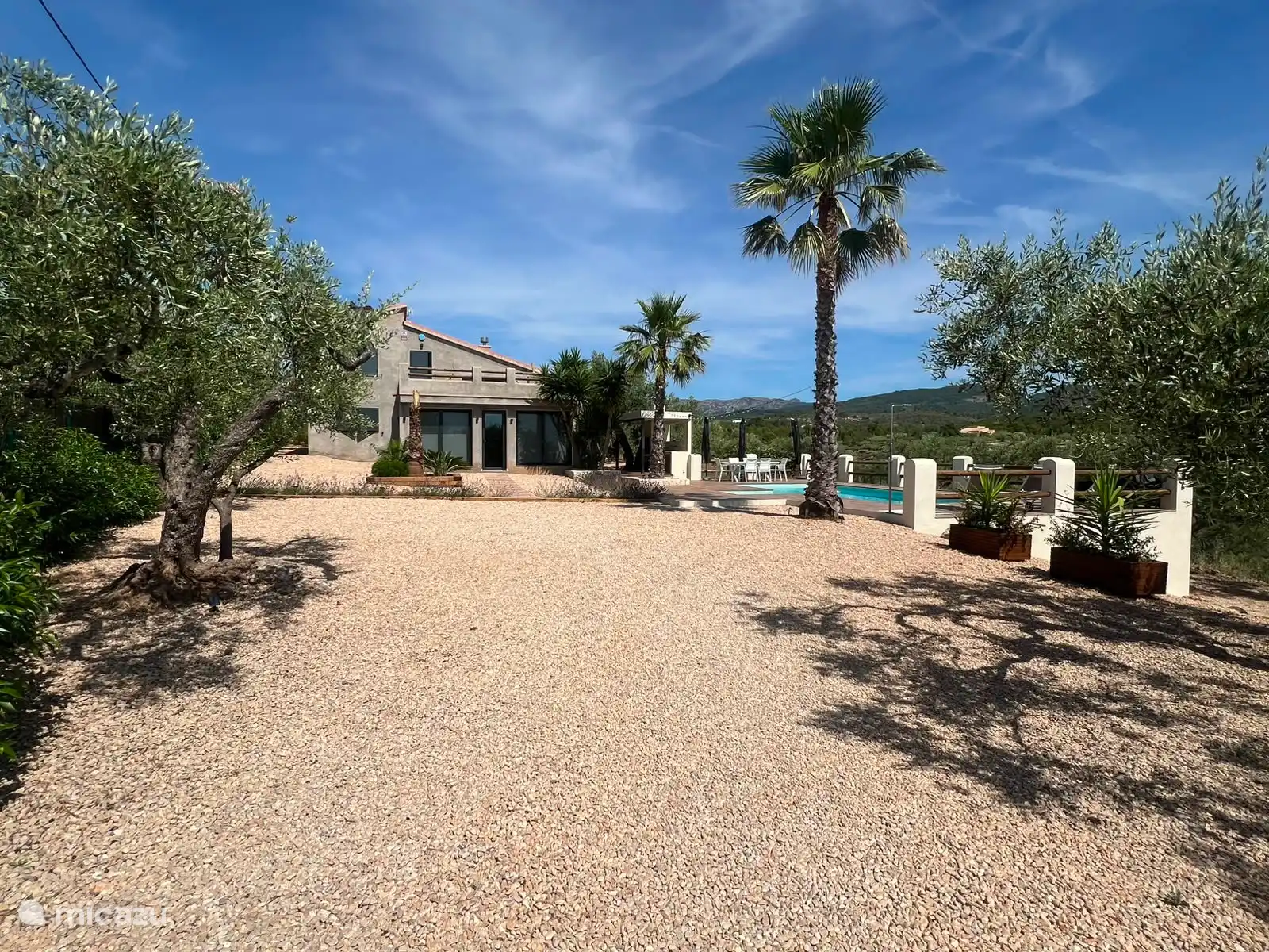 Our garden and pool offer a peaceful Mediterranean escape, surrounded by palm and olive trees, sunshine, and stunning countryside views.