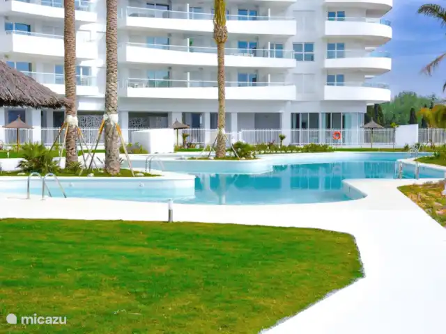 Gran Canet: luxe, strand, Valencia! huren in Spanje, Valencia, Canet d'En Berenguer - appartement De mediterrane tuin, ligweide en grote inloopzwembad op de begane grond