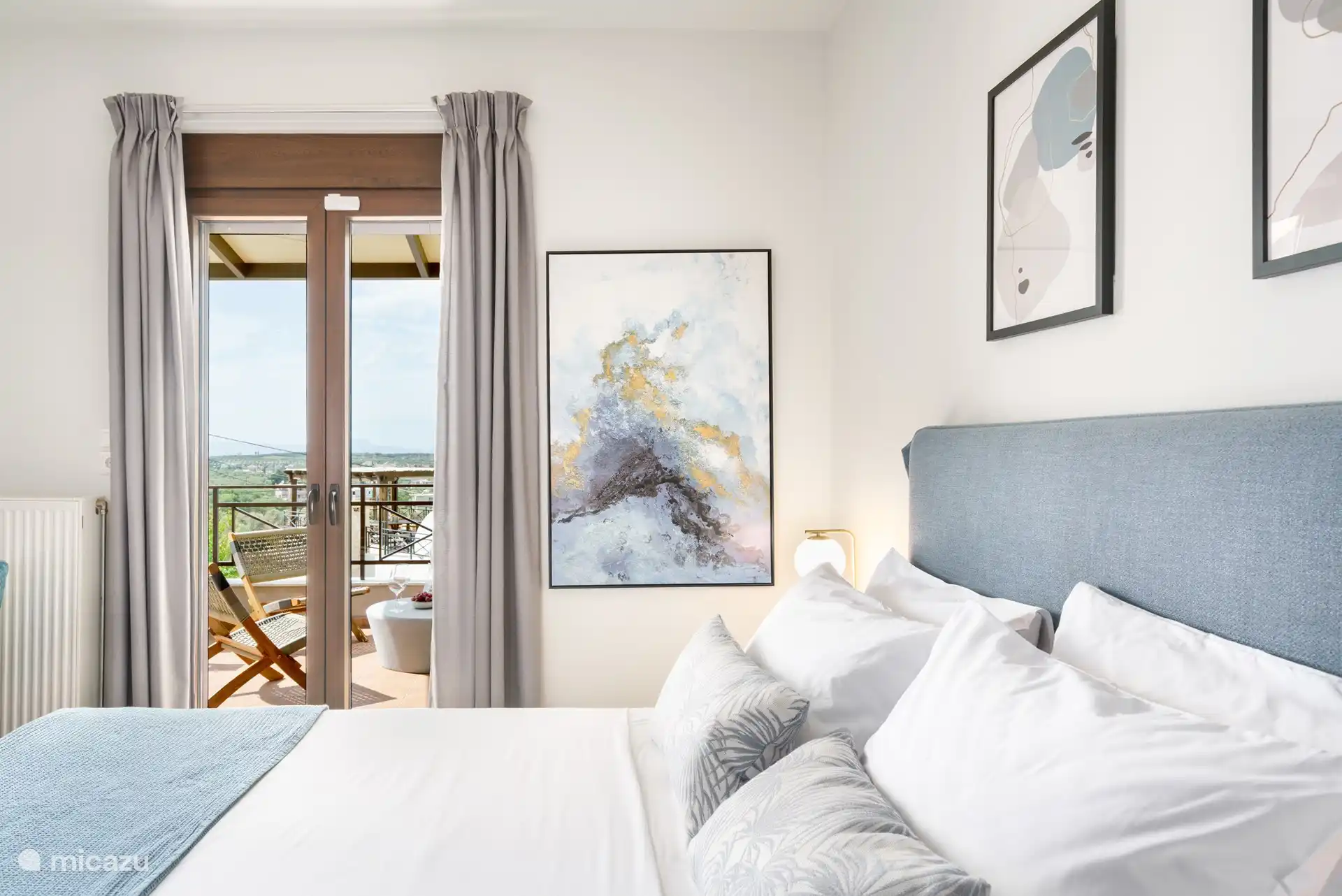 Master bedroom with access to upper balcony lounge area