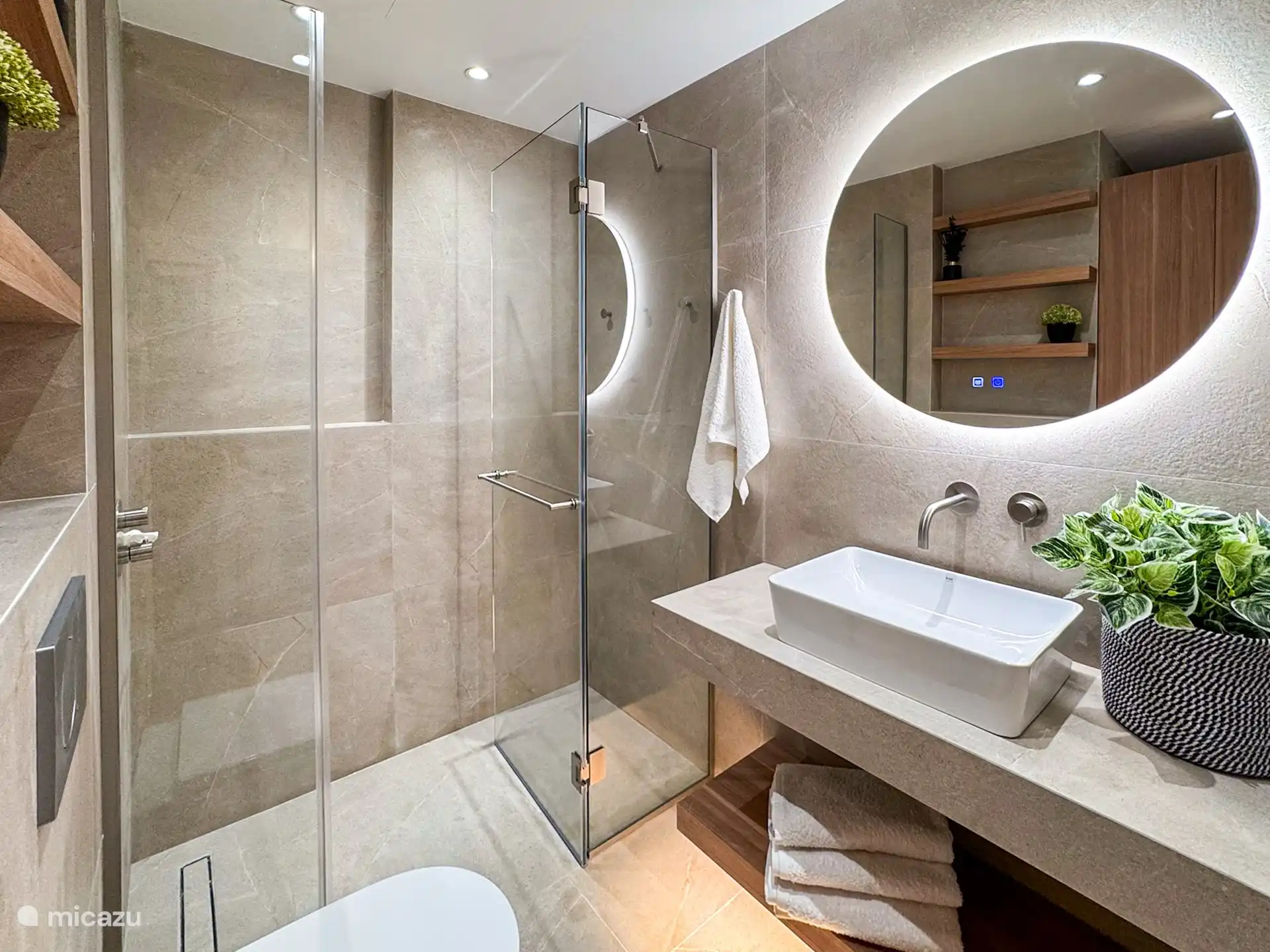 Upstairs bathroom with walk in shower and washing machine 