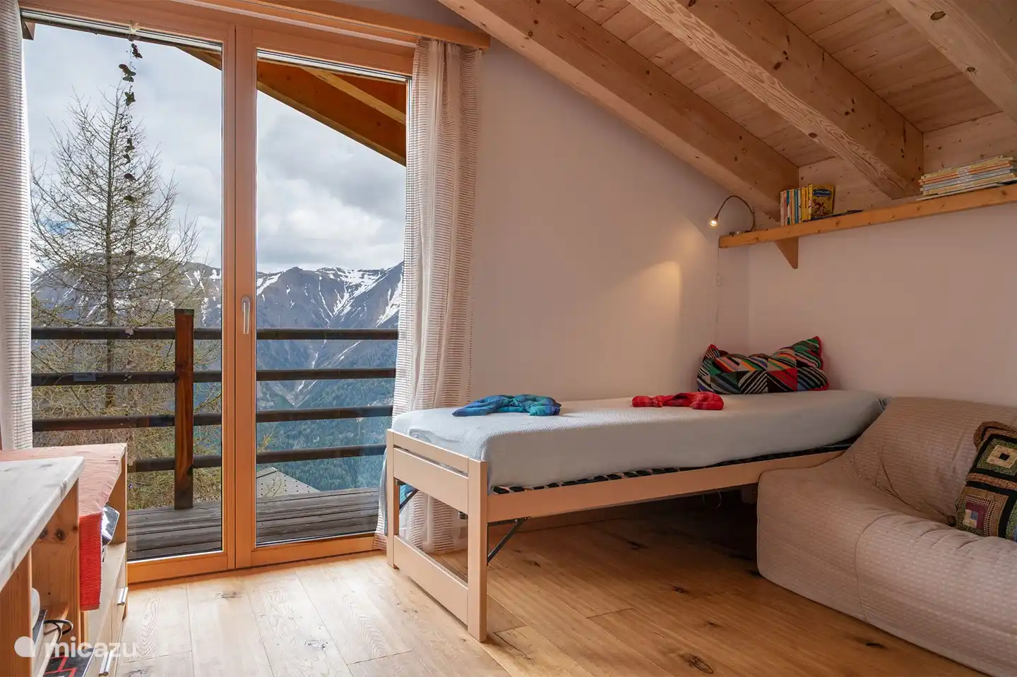 1 TV room with 2 additional single beds, no TV in the living area.