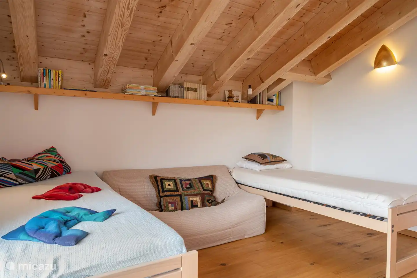 1 TV room with 2 additional single beds, no TV in the living area.