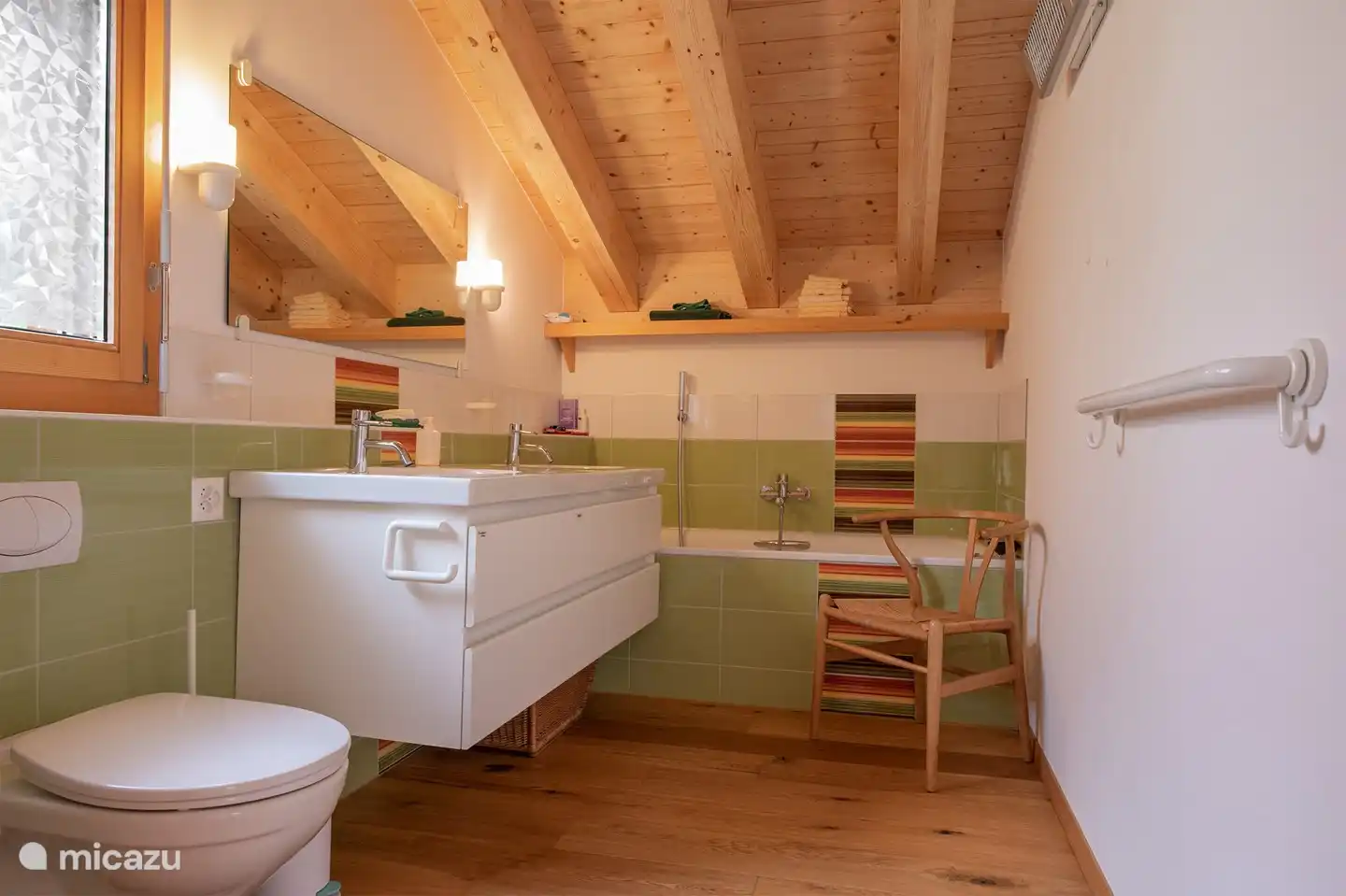 1 bathroom with shower, bath, toilet and double sink.