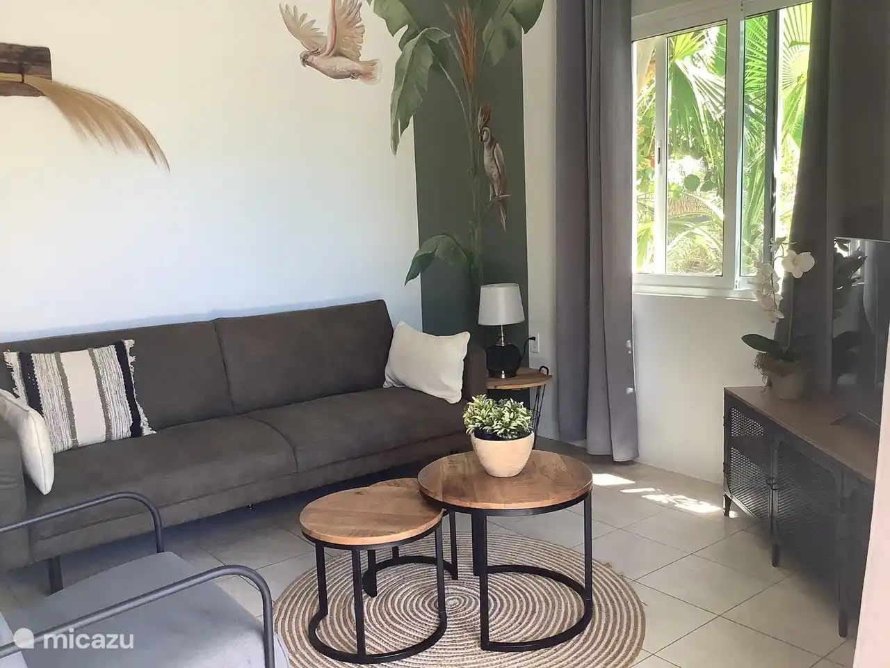 Living room with beautiful mural