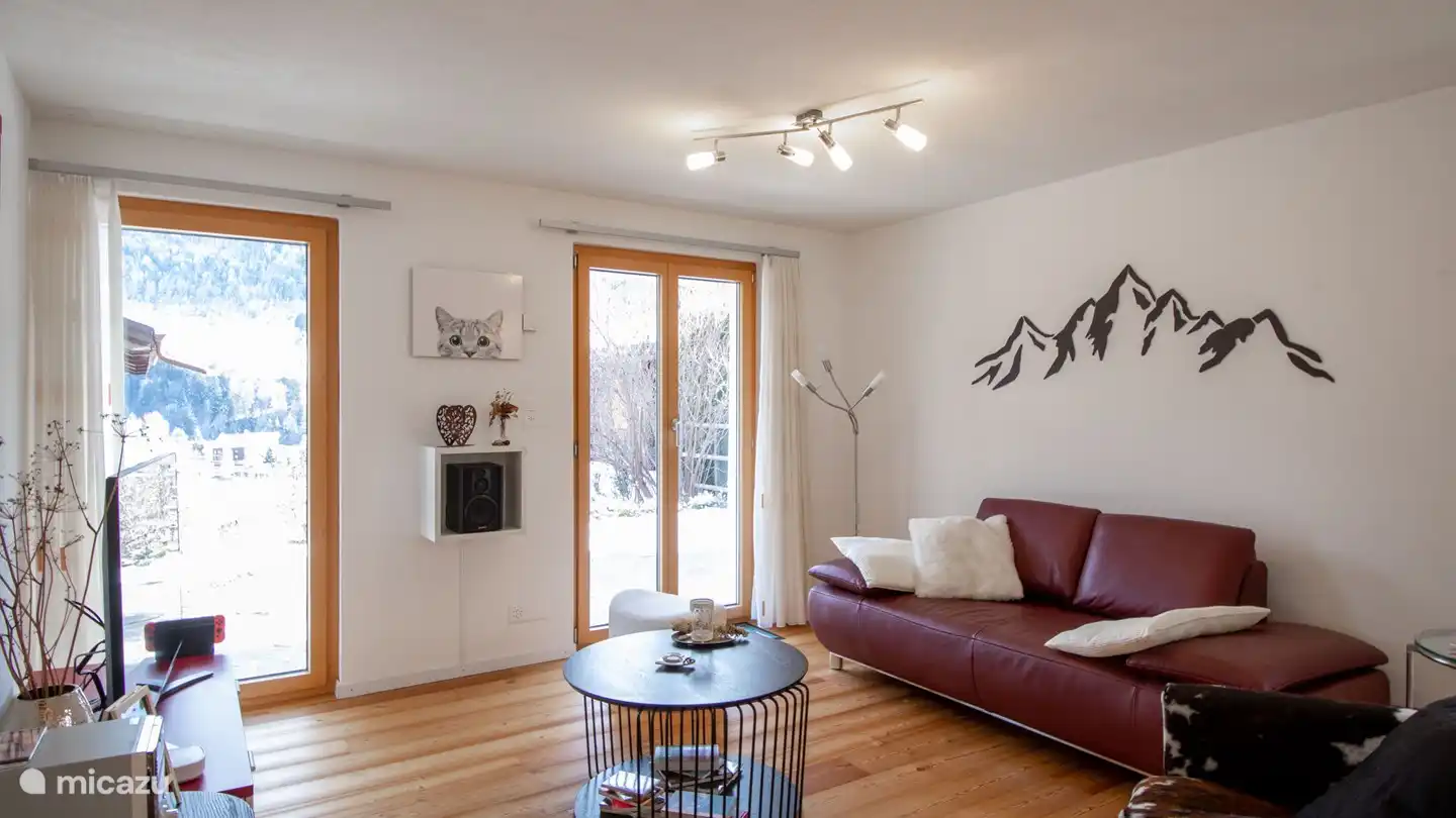 Living-dining room with open kitchen, entrance with cloakroom,