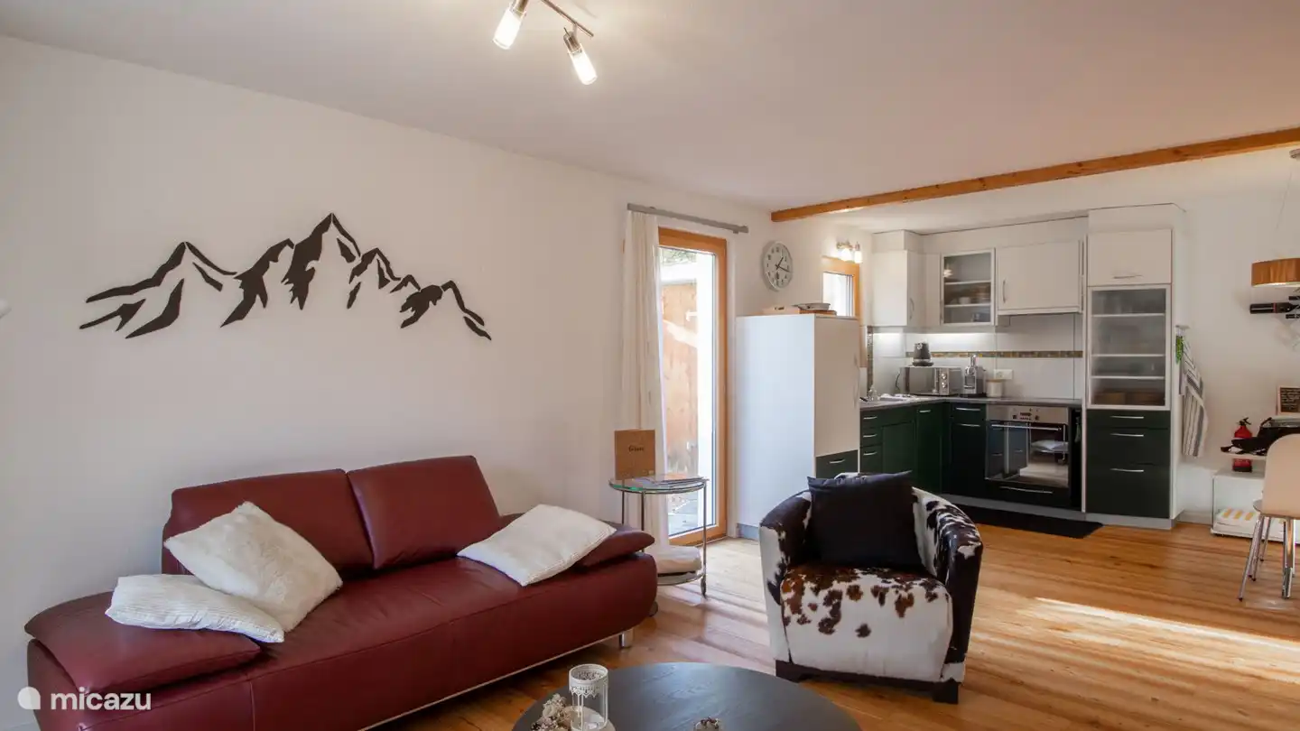 Living-dining room with open kitchen, entrance with cloakroom,