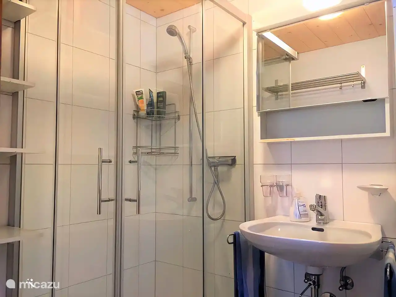 bathroom with shower and sink,