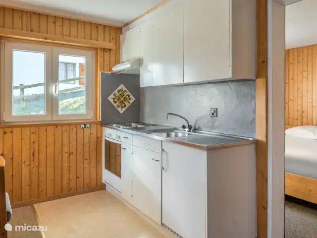 Location de Vacances Suisse, Valais, Fiesch, appartement - Lotus UG Salon-salle à manger avec cuisine ouverte