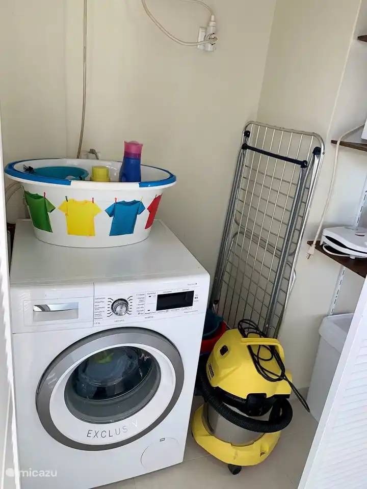 Full automatic washing machine with possibility for hot washing