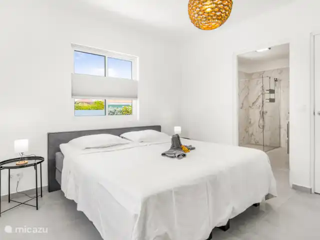 Villa Cinta - Home of Ease huren in Curaçao, Banda Abou (west), Fontein - villa BB-01 Villa Cinta - Slaapkamer 1