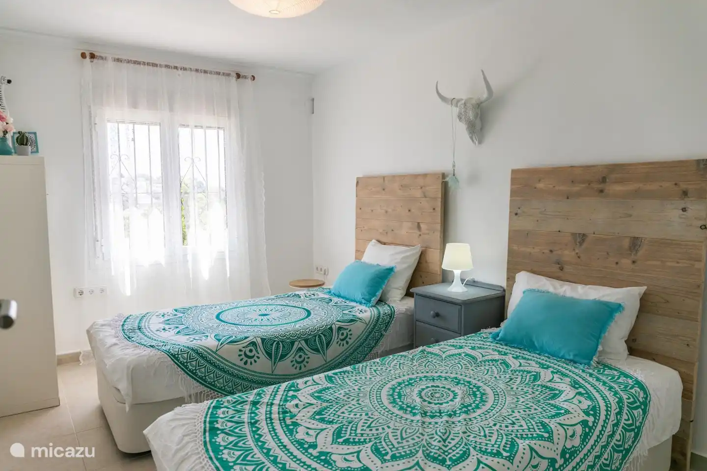 Chambre avec deux lits simples