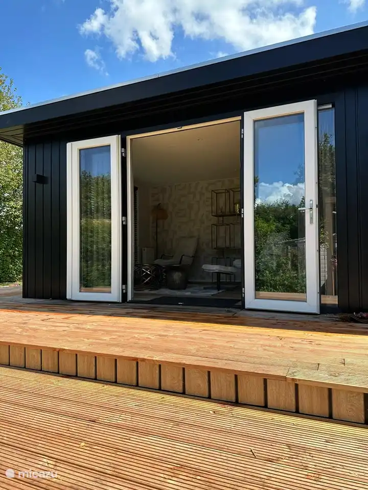 Französische Türen. Auf diese Weise bringen Sie das Äußere nach innen und umgekehrt.
