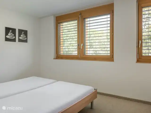 Eilander Sunshine en Suiza, Valais, Fiesch - apartamento Dormitorio con 2 camas