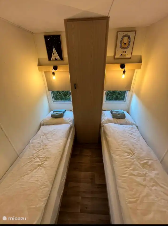 Bedroom 2 with separate beds.