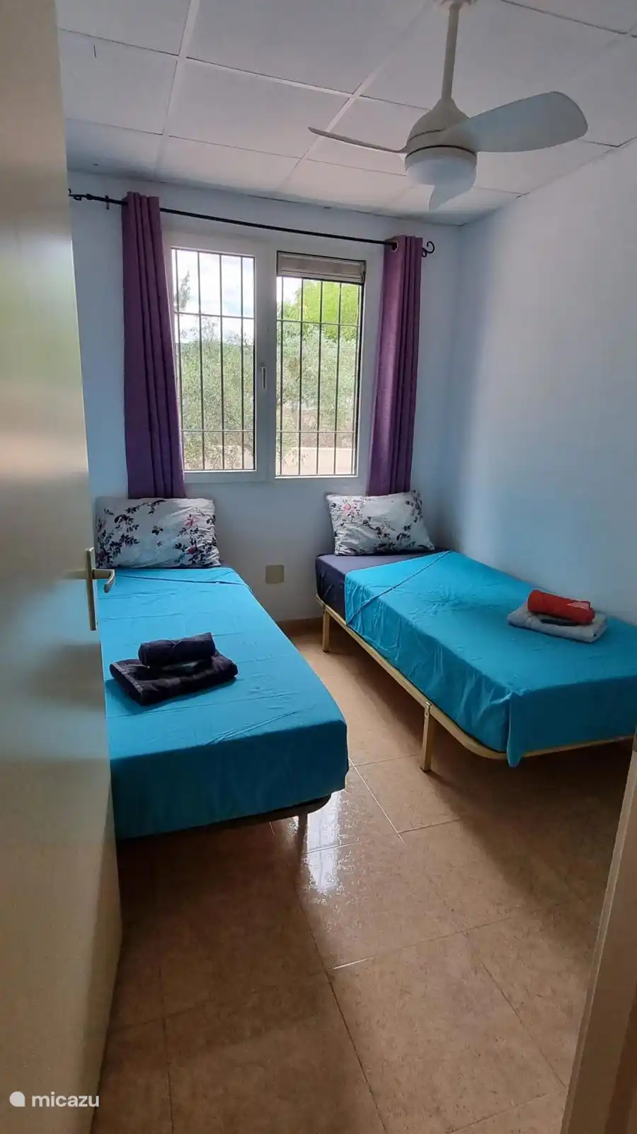 Slaapkamer met 2 eenpersoonsbedden