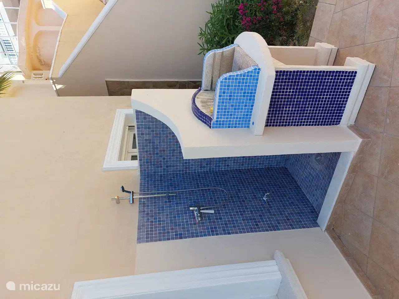 Outdoor shower with BBQ grill