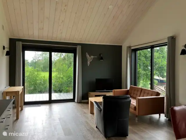 Fietsen, Nederland, Friesland, Oudwoude, bungalow De kolibrie Woonkamer