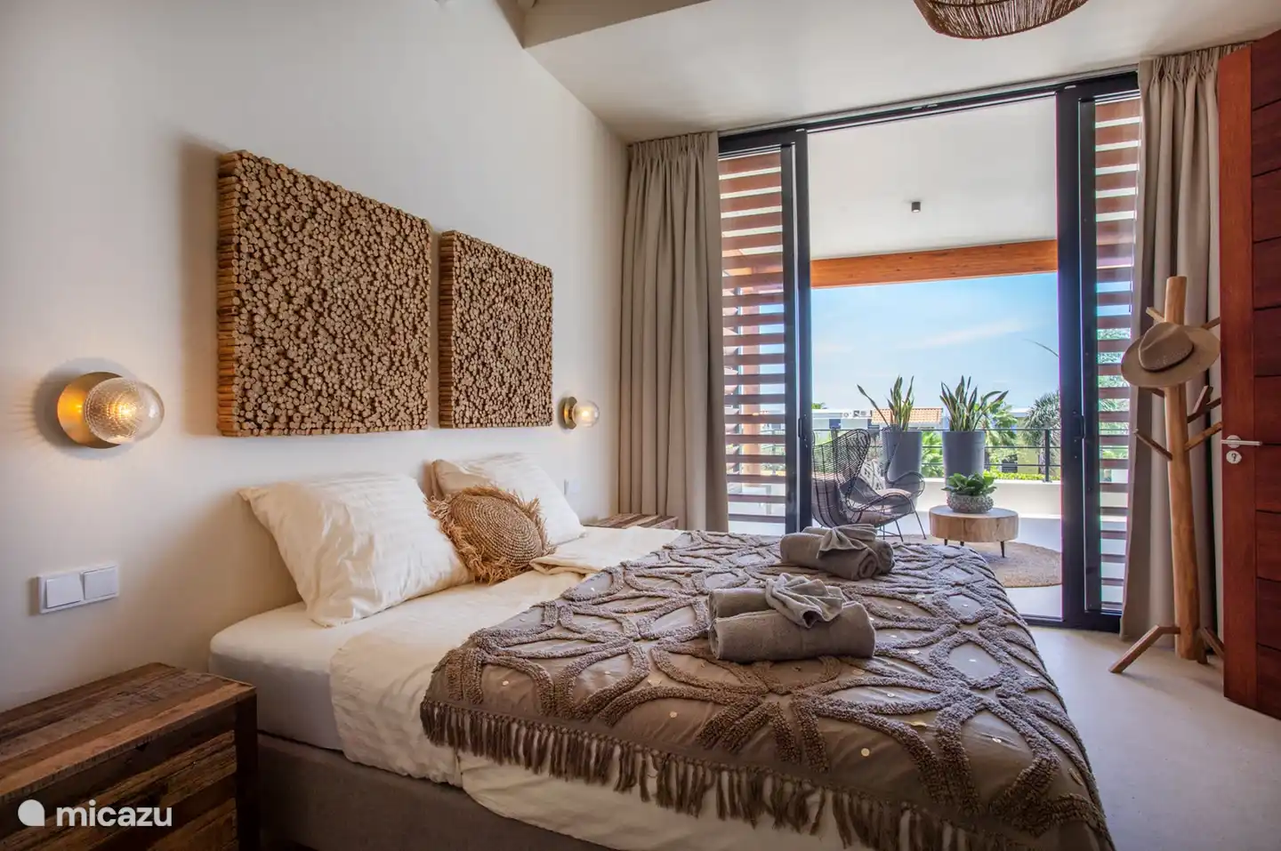 From this bedroom you can walk straight onto the porch.