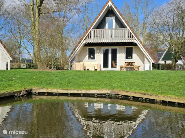 Moderne 6 pers. maison de vacances | Pays-Bas, Overijssel, Gramsbergen - maison de vacances Arrière de la maison de vacances, où vous pourrez profiter de la terrasse. Que ce soit avec un livre sur le salon ou en dégustant un repas dehors à la table de pique-nique.