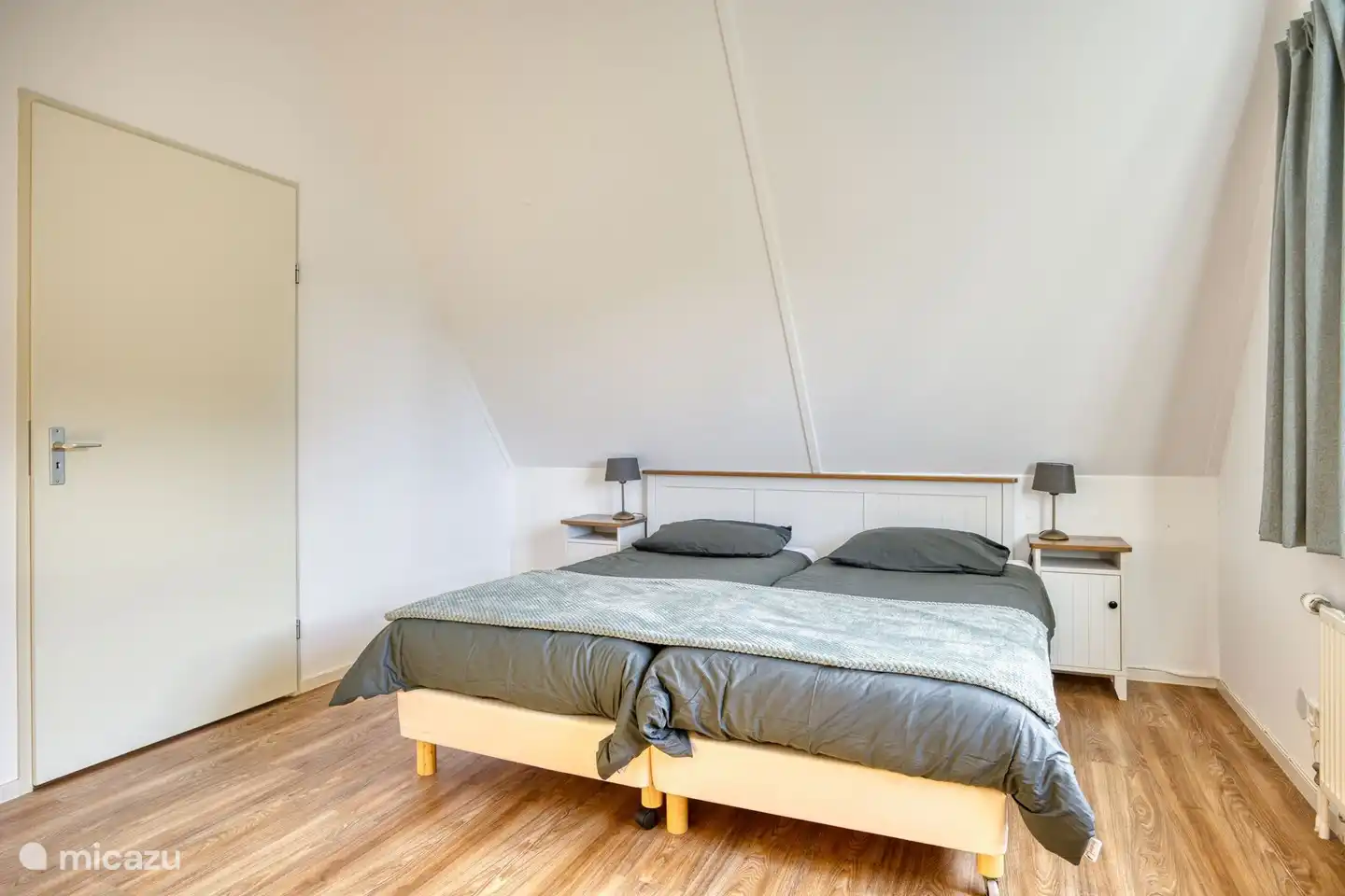 Schlafzimmer 1 mit Doppelbett.