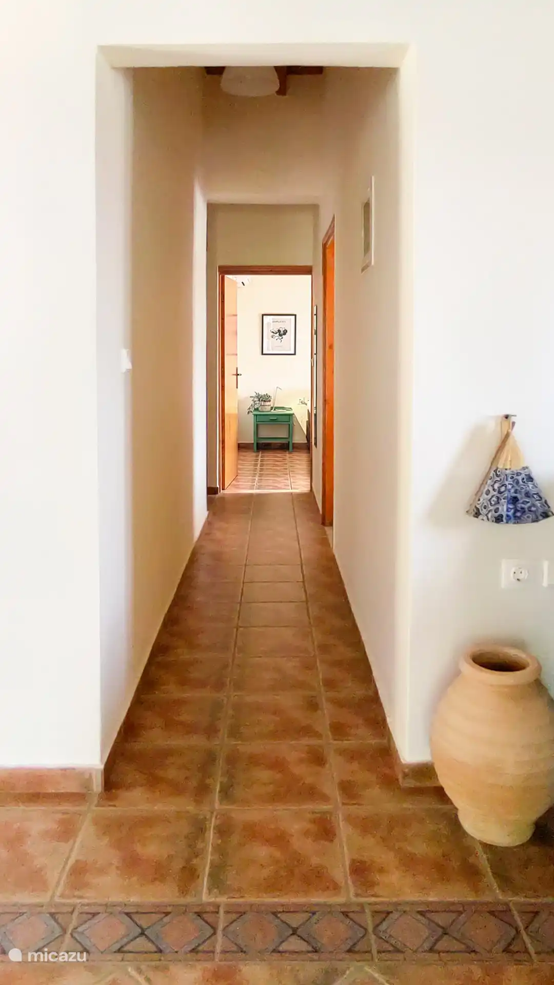 Hallway to bathroom and bedrooms