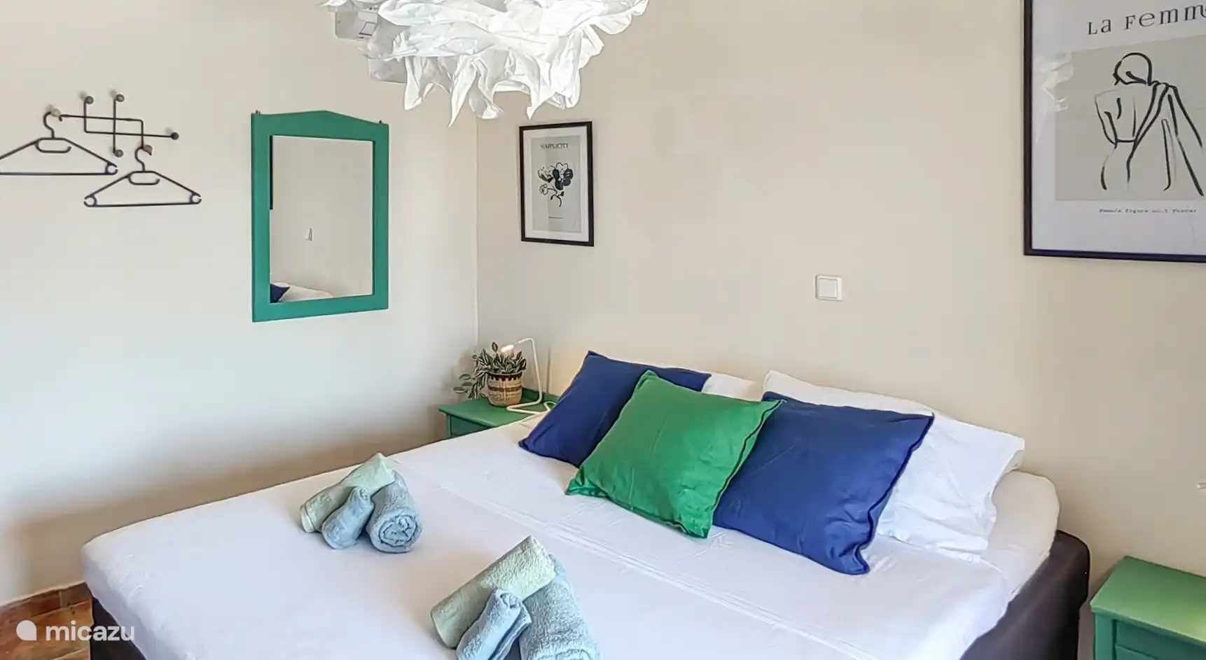 2 person bedroom with box spring and a large wardrobe for all your clothes