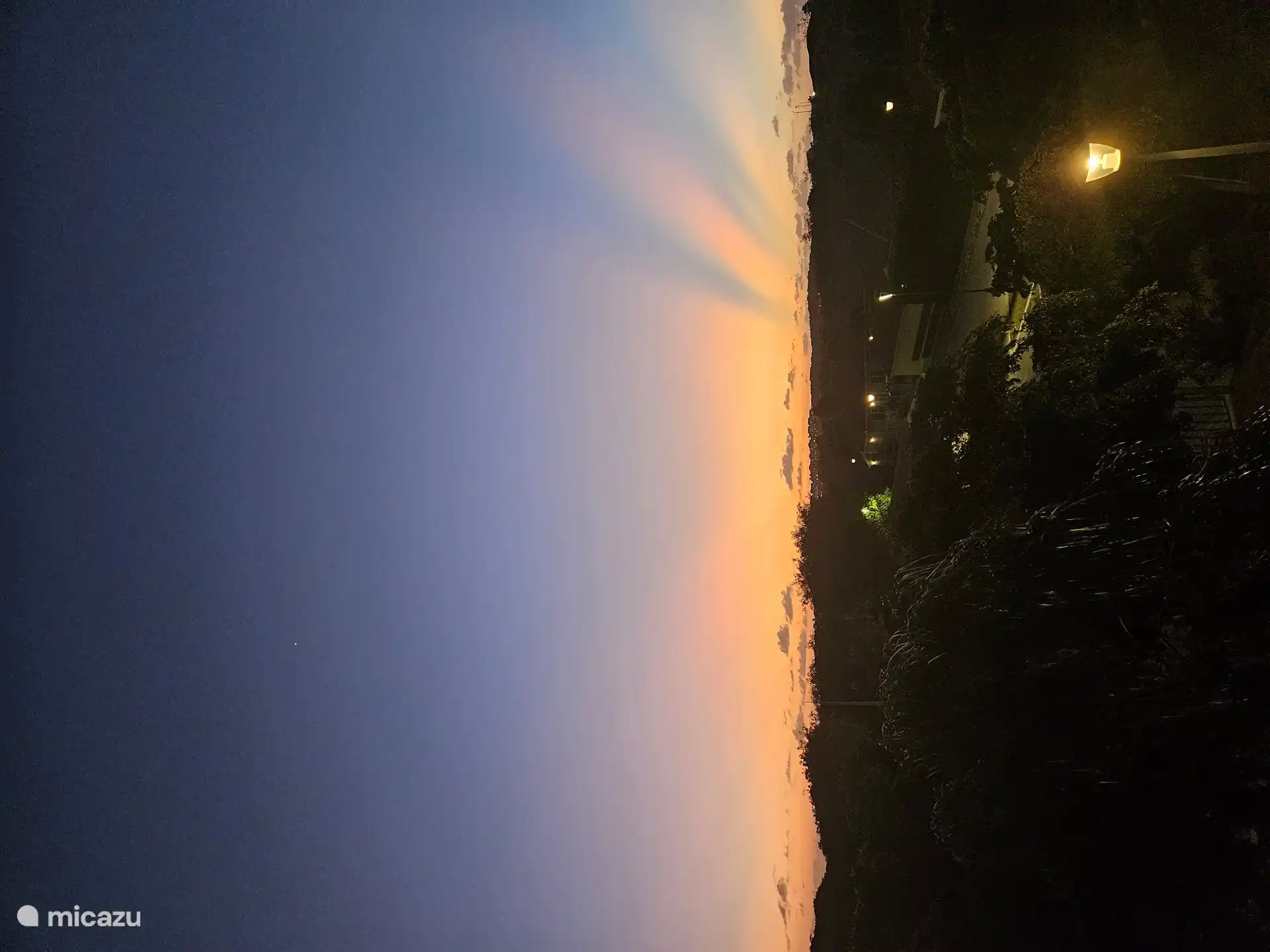 Der Sonnenuntergang von der Veranda aus