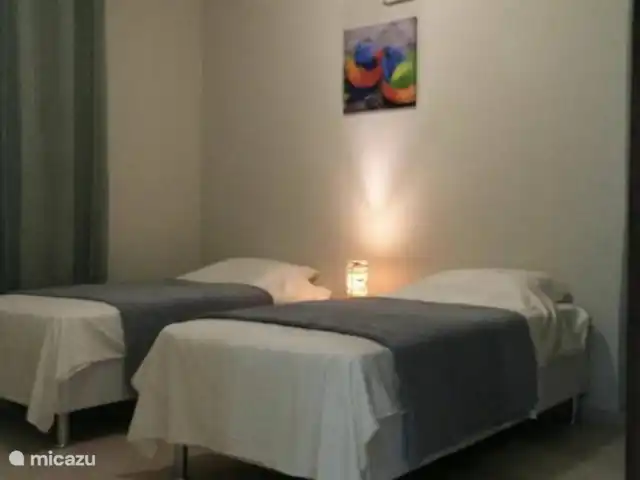 appartement huren in Curaçao, Curacao-Midden, Piscadera – Andira Apartments, Zwembad, Centraal Slaapkamer 1 (bedden kunnen aan elkaar of los)