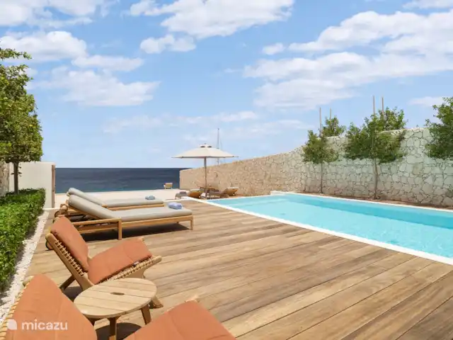Location de Vacances Bonaire, Bonaire, Sabadeco, villa - Reef Villas Bonaire Soleil, face à l'océan Piscine avec vue sur l’océan