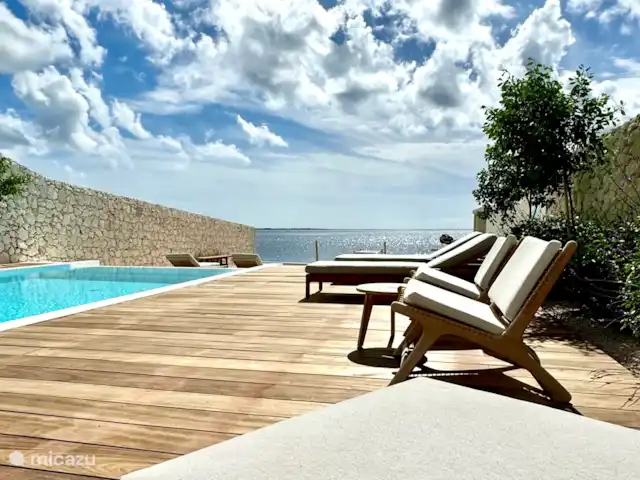 Location de Vacances Bonaire, Bonaire, Sabadeco, villa - Reef Villas Bonaire Soleil, face à l'océan Piscine en bord de mer