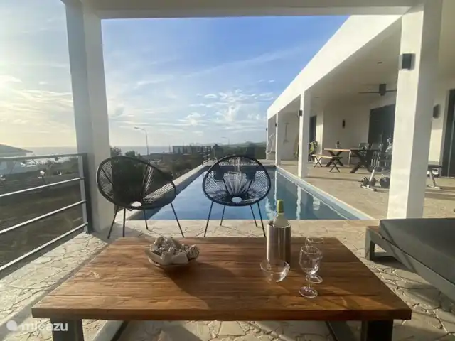 villa huren in Bonaire, Bonaire, Kralendijk – Villa Bonagio Bonaire View van de lounge set richting Washington Slagbaai Park