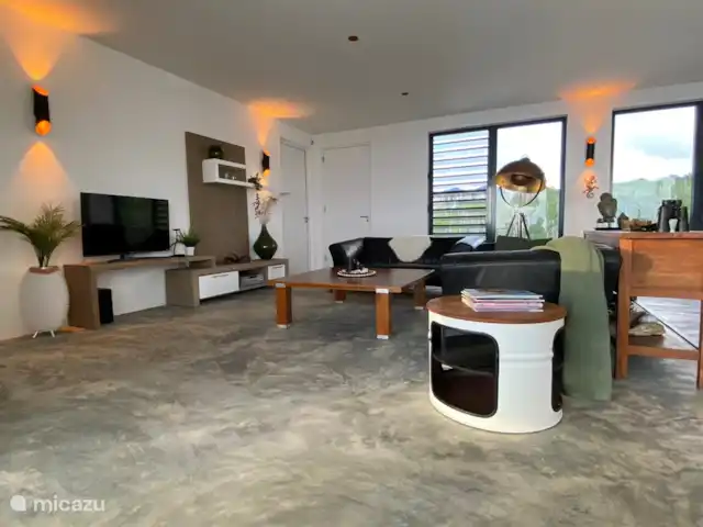 villa huren in Bonaire, Bonaire, Kralendijk – Villa Bonagio Bonaire de woonkamer bevindt zich direct achter het terras