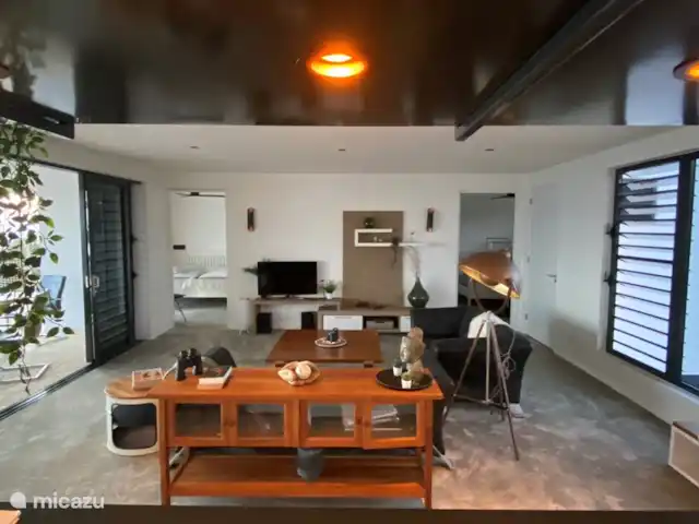 villa huren in Bonaire, Bonaire, Kralendijk – Villa Bonagio Bonaire zicht op de woonkamer vanaf de keuken