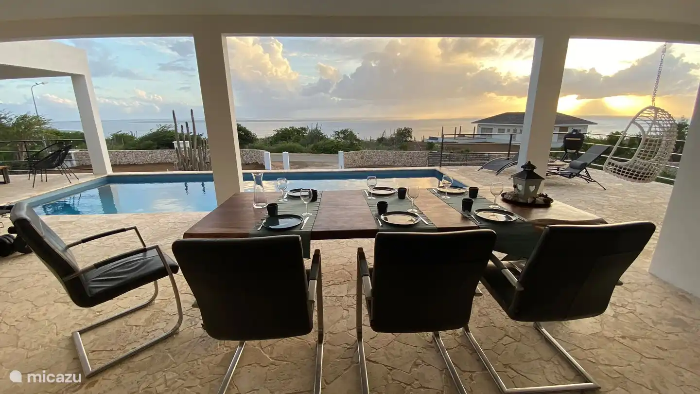 The dining and living table is on the spacious terrace