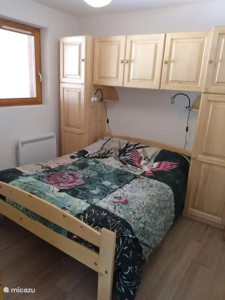 The second bedroom gives direct access to the bathroom with shower