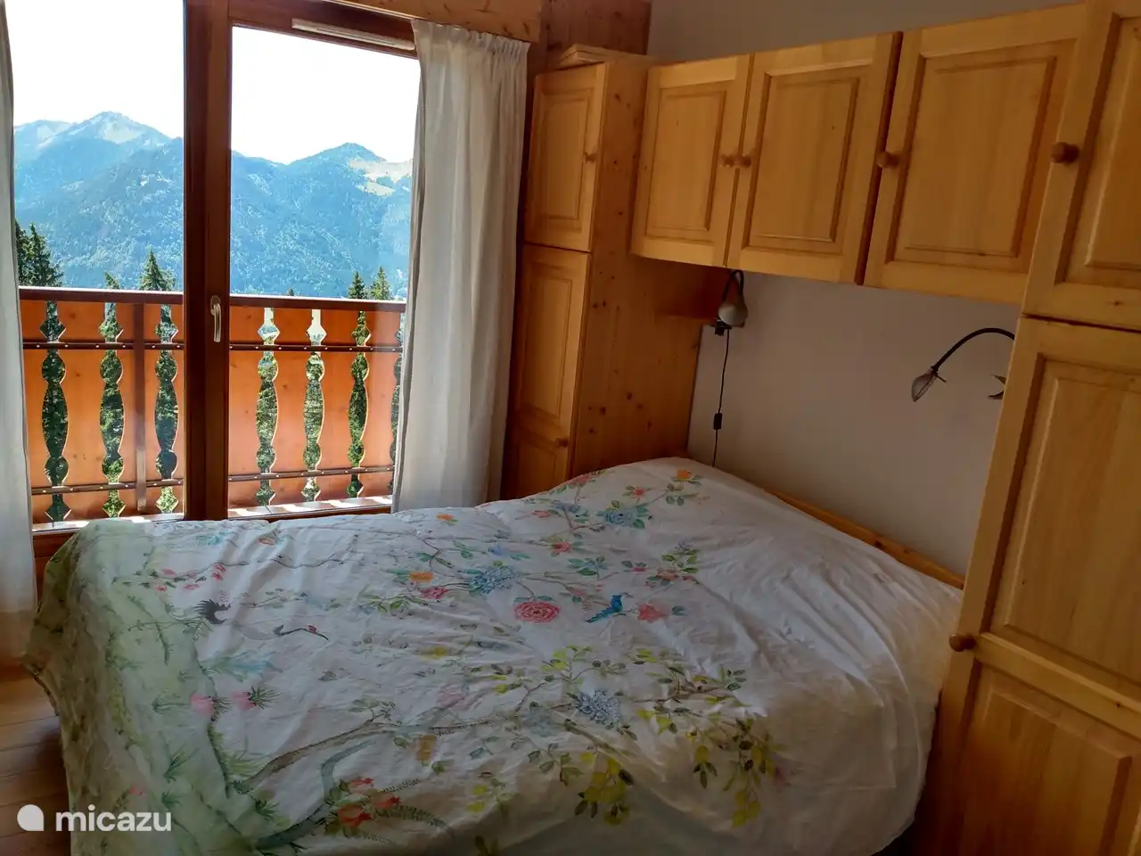 bedroom with access to balcony