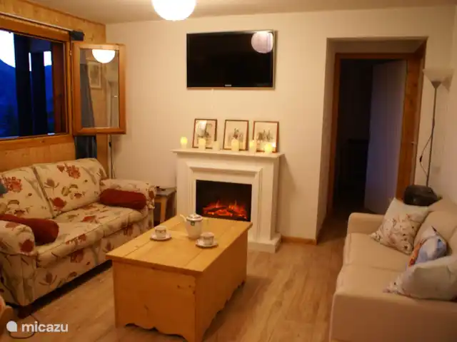 Location de Vacances France, Haute-Savoie, Morzine, appartement - panorama montagneux à couper le souffle Soirée dans le salon