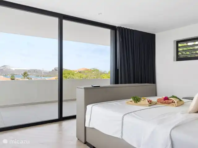 Villa B08 huren in Curaçao, Banda Ariba (oost), Vista Royal - villa Uitzicht vanuit de master bedroom