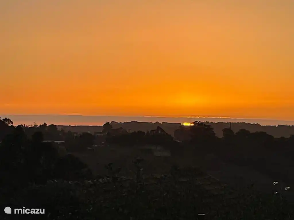 Beautiful warm orange sky.
What will the weather be like tomorrow?