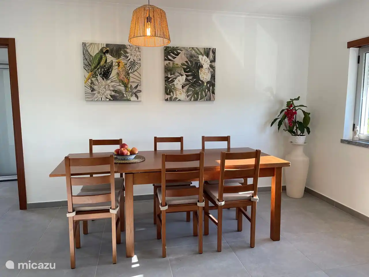 Spacious dining table suitable for 6-8 people.