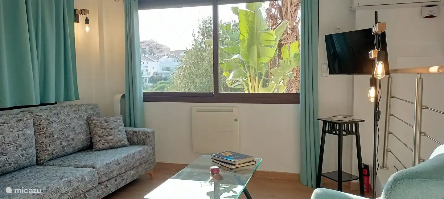 Sala de estar con vistas al campo de golf