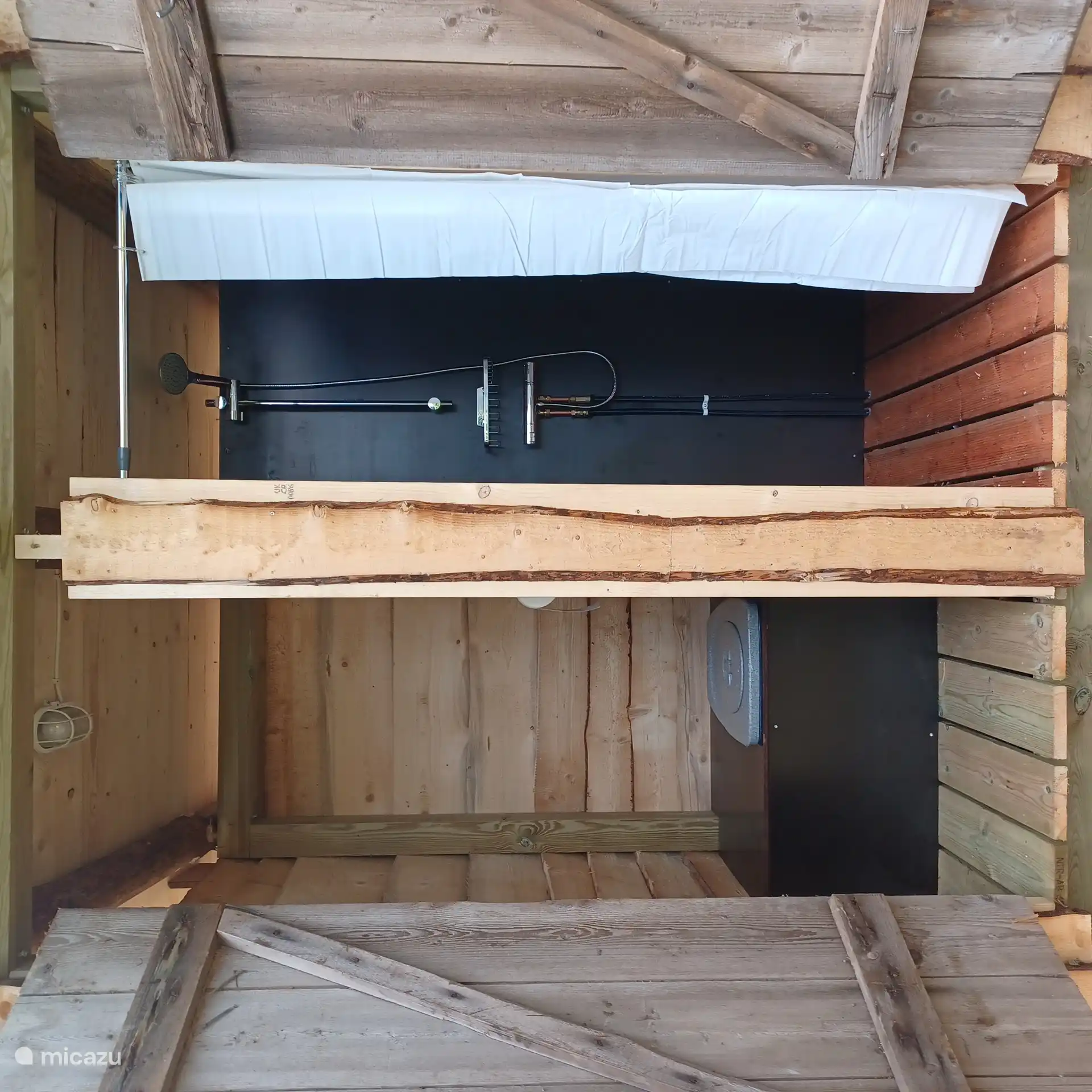 inside bio toilet and outdoor shower